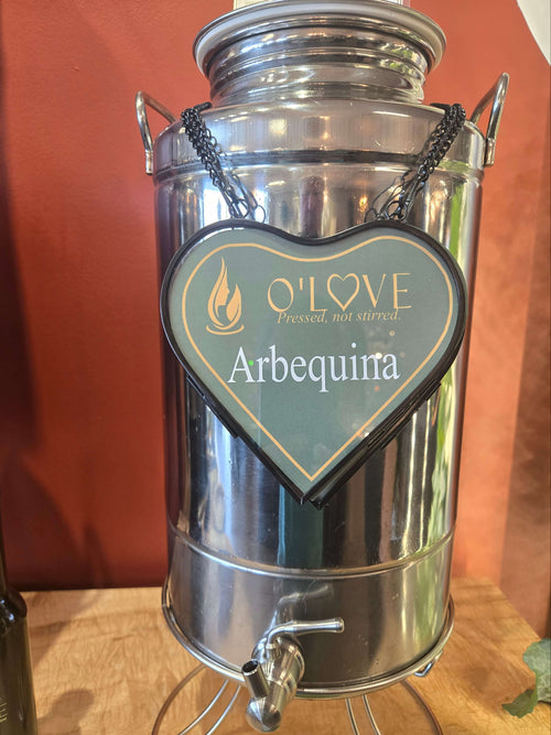 Metal container with sign showing Arbequina