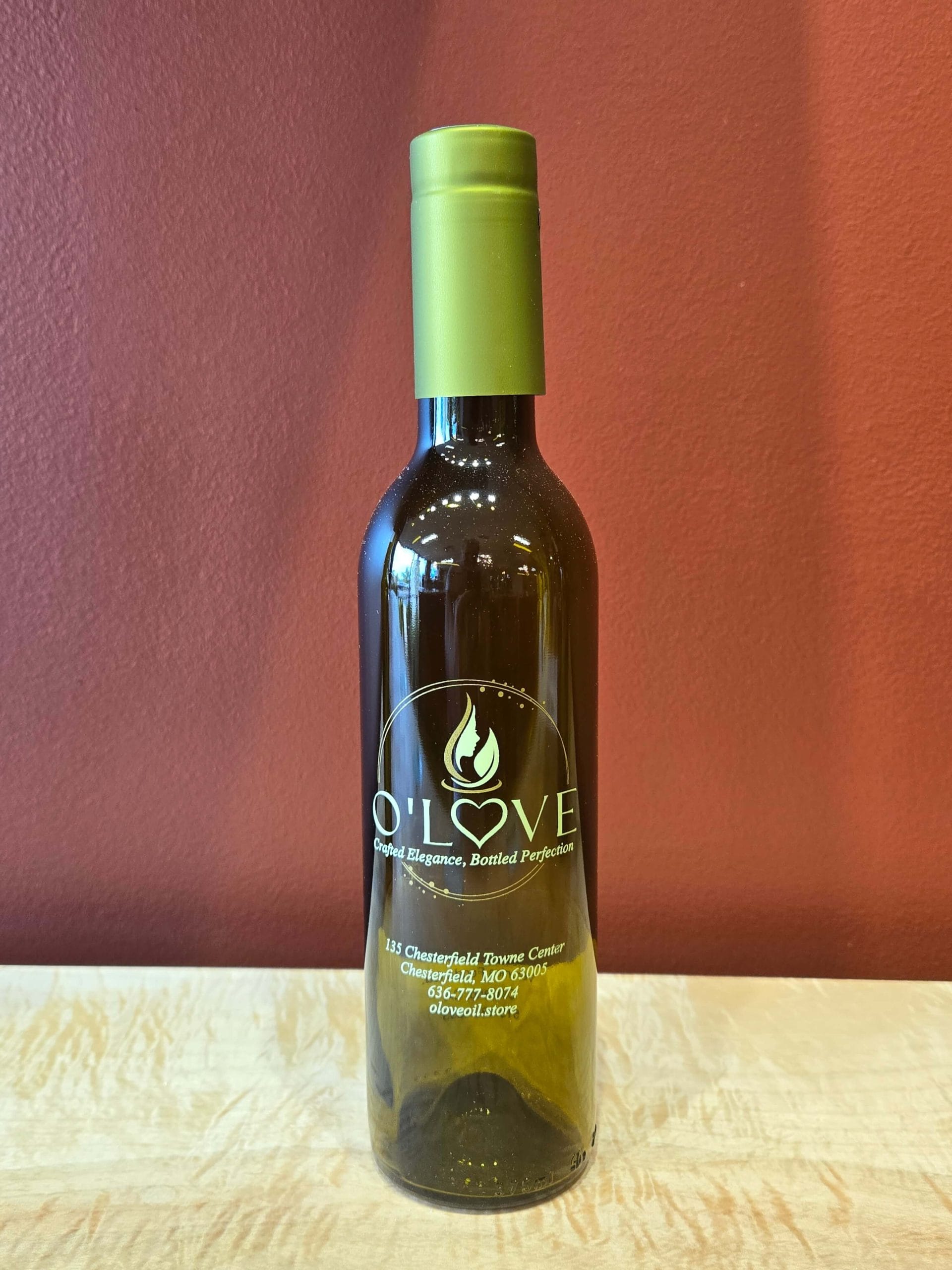 Medium glass bottle of olive oil