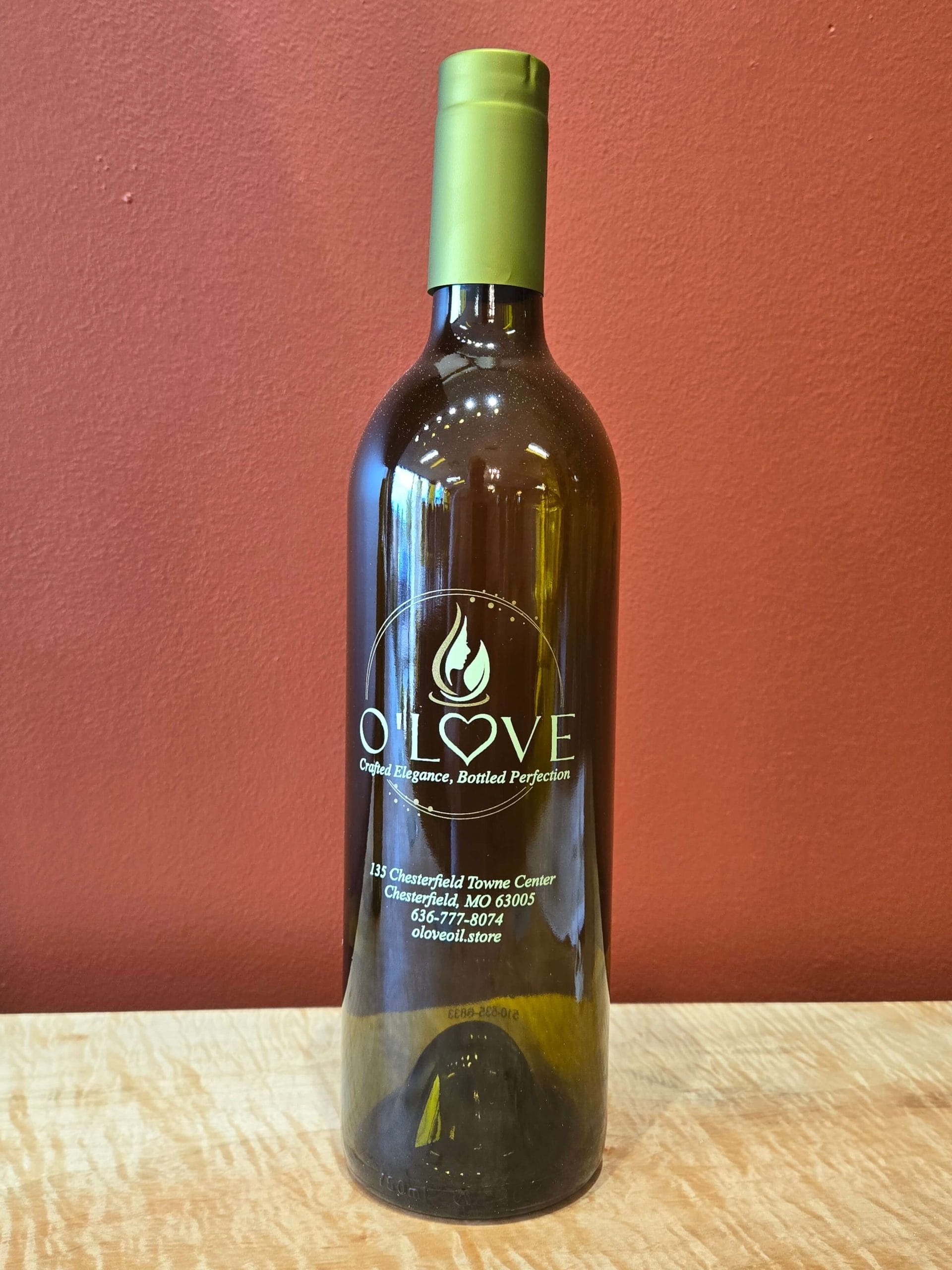 Large glass bottle of olive oil