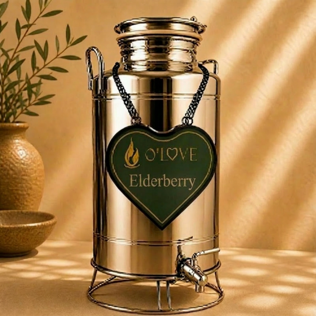 Silver herb dispenser with a heart-shaped 'O'Love Elderberry' label on a beige background.