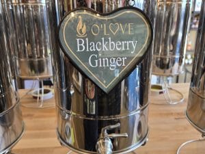 Metal container with Blackberry Ginger sign