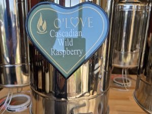 Metal container with Cascadian Wild Raspberry sign