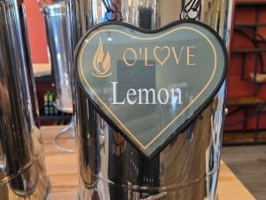 Metal container with lemon sign