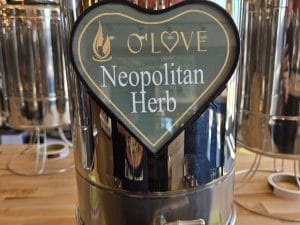Metal container with Neopolitan Herb sign