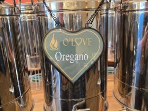 Metal container with Oregano sign