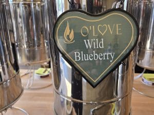 Metal container with Wild Blueberry sign