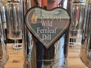 Metal container with Wild Fernleaf Dill sign